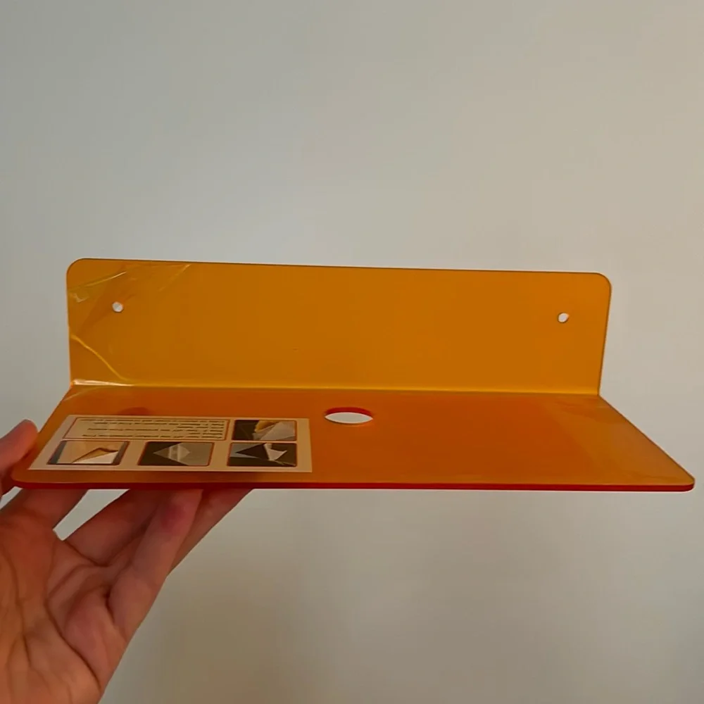 • 2 orange acrylic shelves •